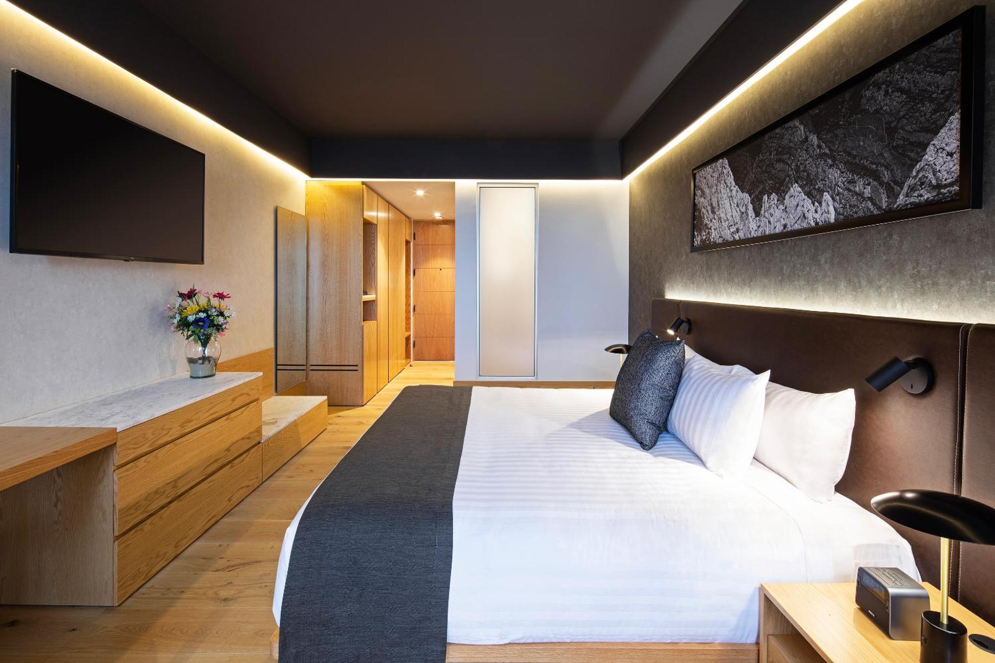 Habitación Brisas Business Club con cama extragrande
